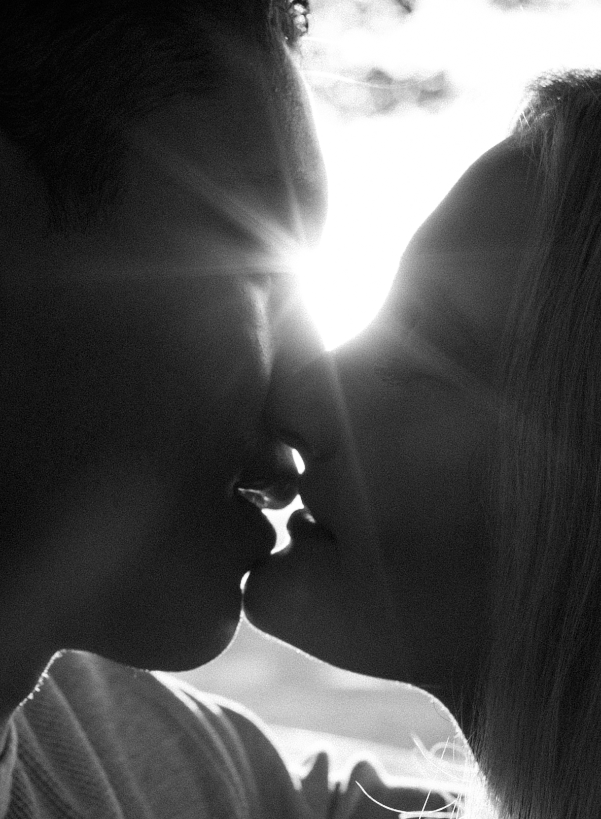 intimate close up kiss between a newly engaged couple in Houston, Texas