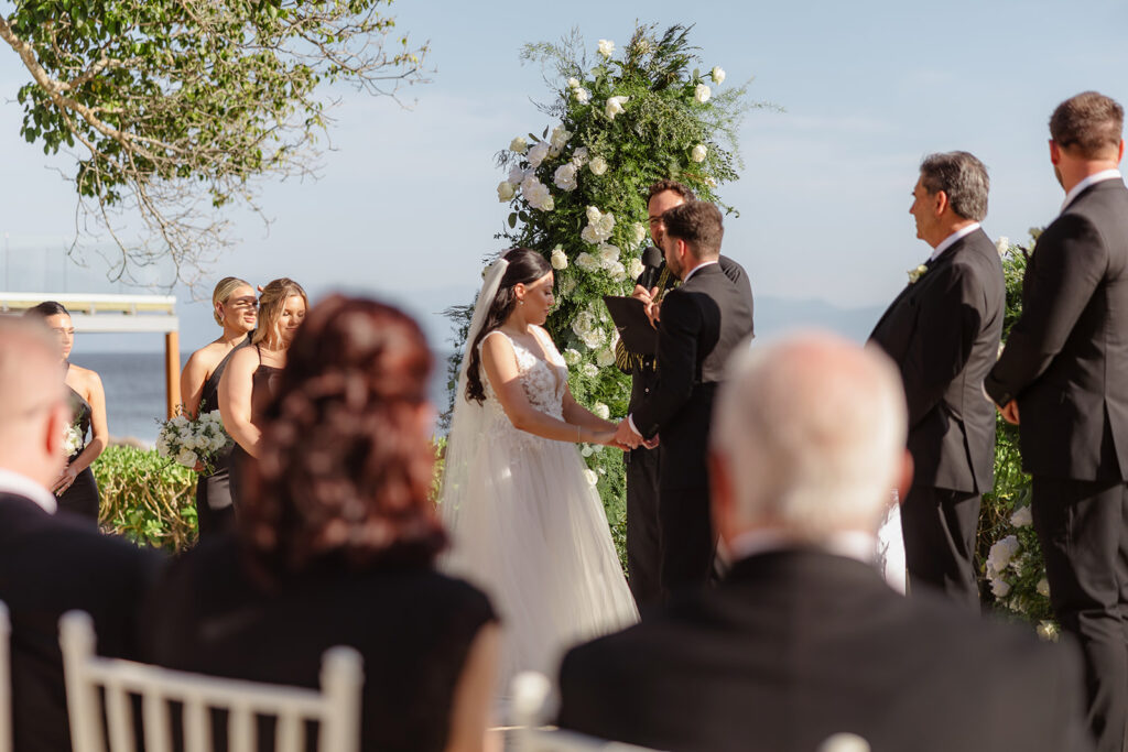 bride and groom photos during ceremony