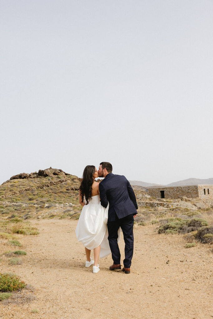 couple posing in greece for wedding photos
