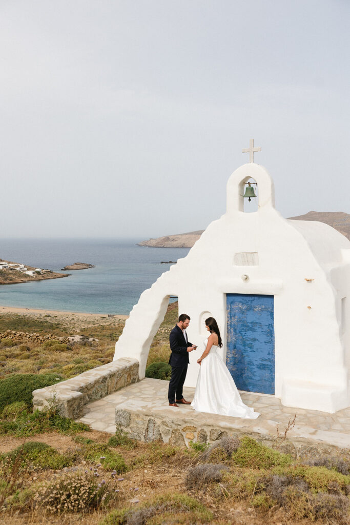 couple posing in greece for wedding photos
