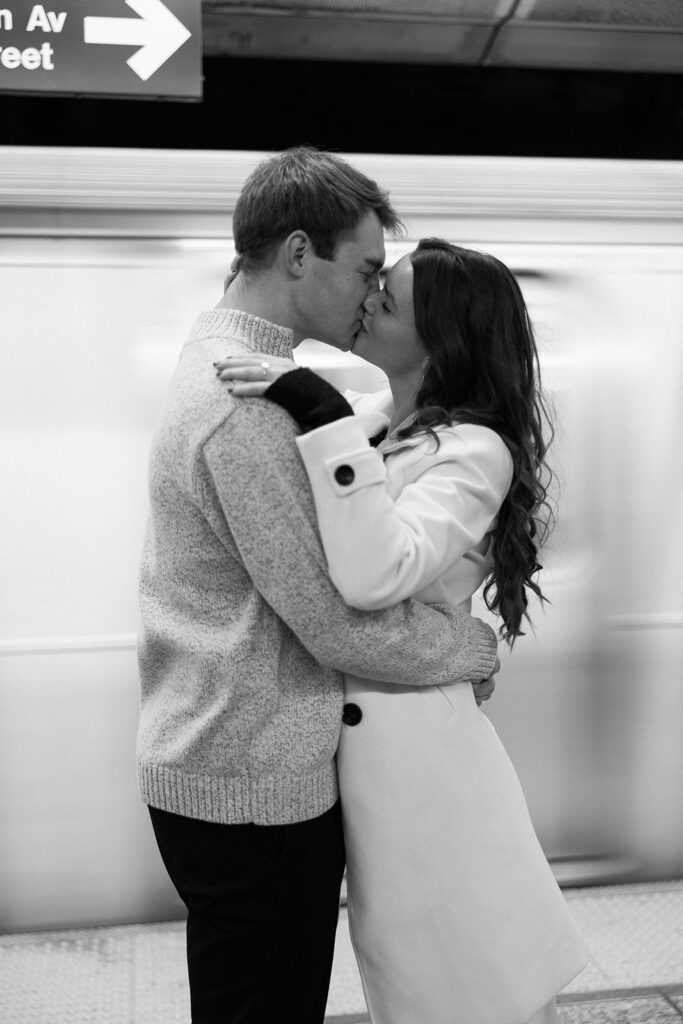 A couple enjoying a relaxed and stylish engagement shoot in New York City, with the city as their backdrop.
