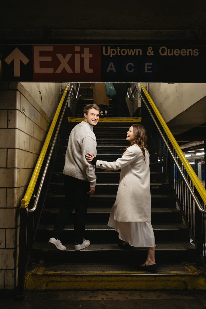 A couple enjoying a relaxed and stylish engagement shoot in New York City, with the city as their backdrop.
