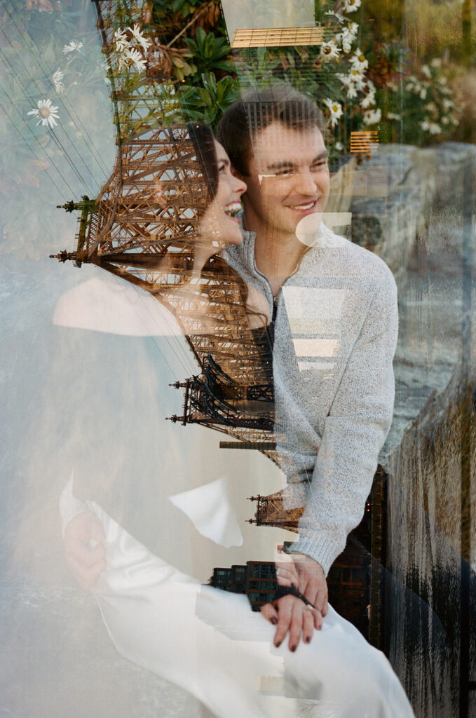 A couple enjoying a relaxed and stylish engagement shoot in New York City, with the city as their backdrop.
