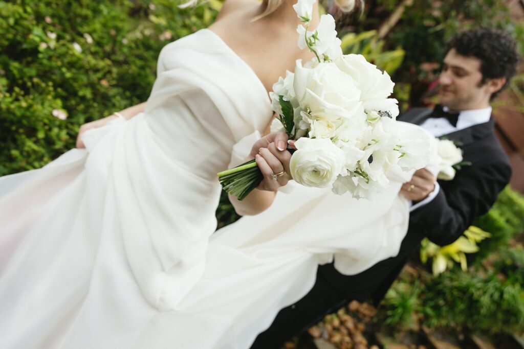 A beautiful wedding day in the rain, featuring genuine moments and documentary-style photography in Houston.
