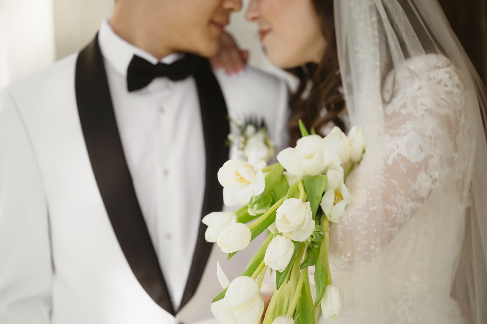 Couple posing for romantic wedding portraits