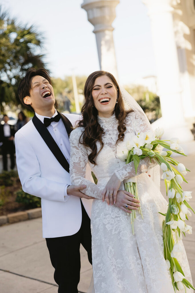 Couple posing for romantic wedding portraits

