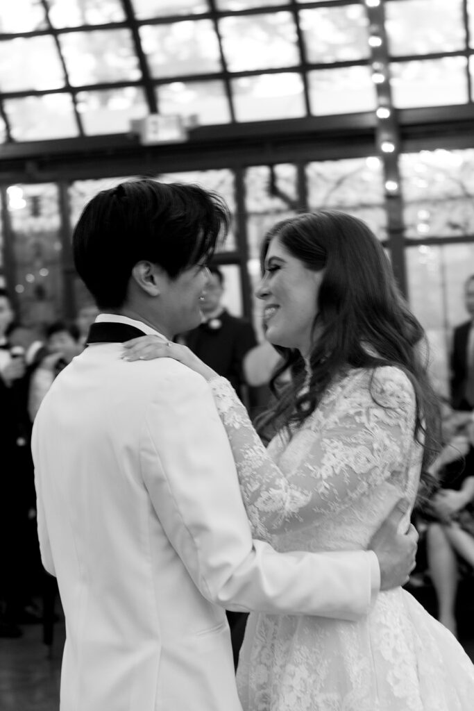 Couple posing for romantic wedding portraits at bryan museum
