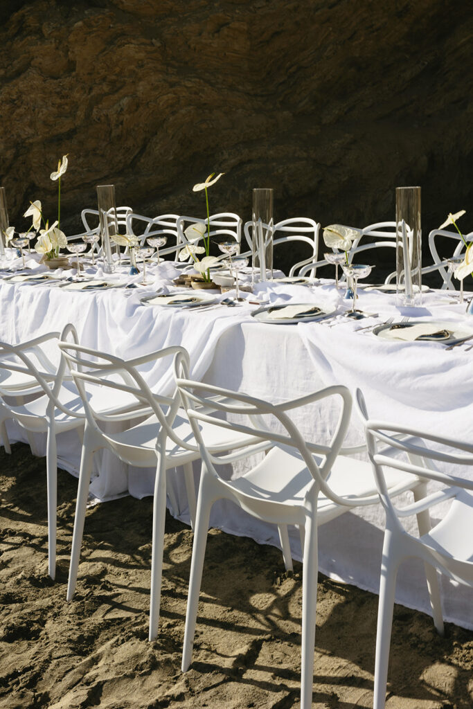 Contemporary beach wedding table setting at Corona Del Mar with neutral tones
