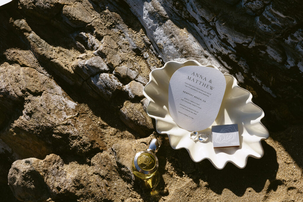 Contemporary beach wedding table setting at Corona Del Mar with neutral tones

